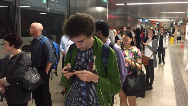 Commuters patiently lined up at King George Square bus station on March 30 waiting for services to take the home.