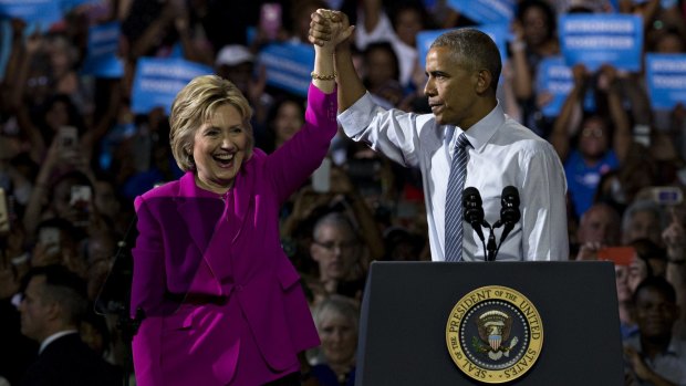 Hillary Clinton, presumptive 2016 Democratic presidential nominee, and US President Barack Obama at their first campaign appearance together on Tuesday.