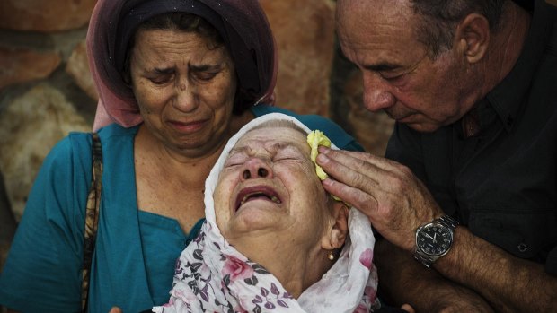 The mother of Albert Alon Govberg, who was shot dead in an attack on a bus, at his funeral in Jerusalem on Wednesday.
