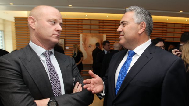 Commonwealth Bank of Australia chief executive  Ian Narev listens to Treasurer Joe Hockey at the summit.