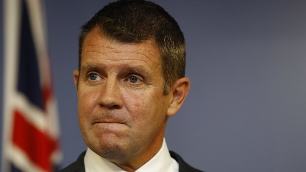 NSW Premier Mike Baird announces his retirement at a press conference on Thursday.