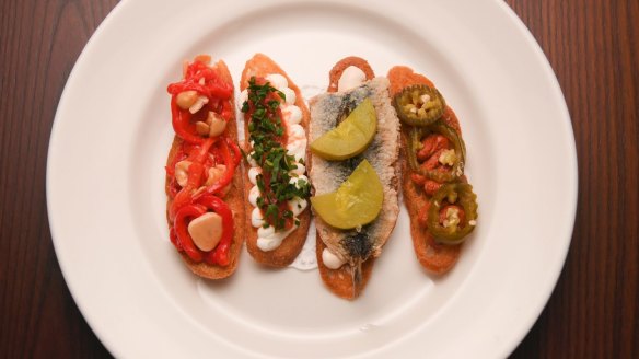 Start with an assortment of crostini.