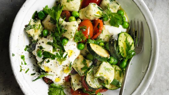 Spinach gnocchi with peas, zucchini, goat's curd and herbs. 