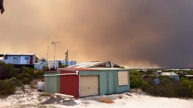 The fire from a beach shack at Wedge Island about 15 kilometres south. 