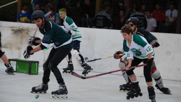 Two of the now 115 teams take to the rink to battle it out  in the Street Roller Hockey League 