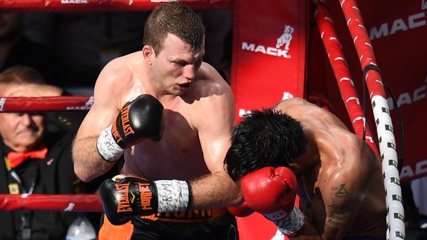 Who's next?: Jeff Horn lands a left on Manny Pacquiao at Suncorp Stadium.... now he wants a new opponent.