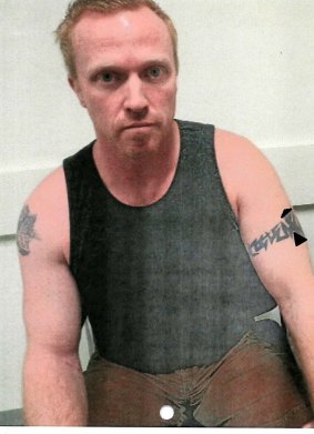 History of violence: Adrian Bayley in police custody after killing Jill Meagher.