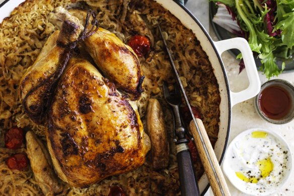 Serve this roast chicken and rice with salad greens, yoghurt and your favourite spicy sauce.