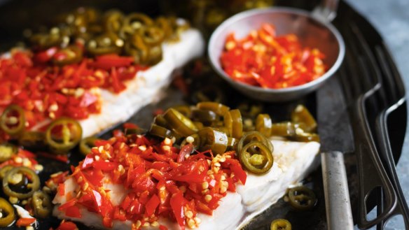 Hunan-style steamed blue-eye trevalla with salted red chilli and pickled green chilli.