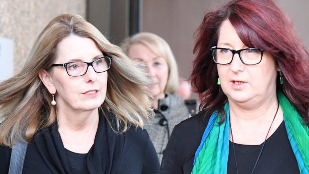 Alison McKenzie (left), widow of Glen Turner, with Glen's sister Fran Pearce, leave court after the sentencing of his murderer Ian Turnbull in June 2016.