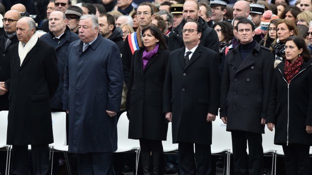 French dignitaries, including Paris Mayor Anne Hidalgo, French President Francois Hollande and Prime Minister Manuel Valls, during Sunday's service of remembrance to mark the one-year anniversary of the Charlie Hebdo attacks.