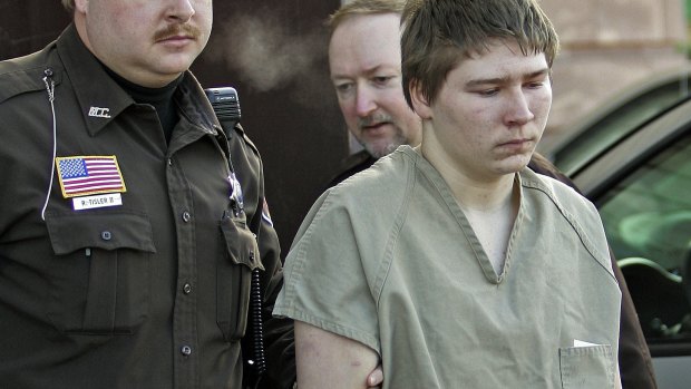 Conviction overturned: Brendan Dassey is escorted out of court in 2006.