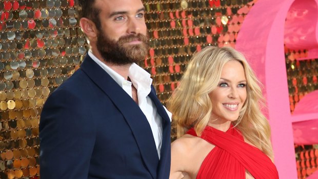 Singer Kylie Minogue, right, and fiance Joshua Sasse. 