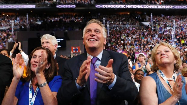 Virginia Governor Terry McAuliffe at the Democratic National Convention earlier in the year. The  billionaire businessman at the centre China's vote-buying scandal also donated to McAuliffe's 2013 campaign.  