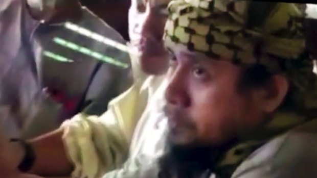 An image taken from video of the purported leader of Islamic State's south-east Asian branch, Isnilon Hapilon, at a meeting of militants at an undisclosed location. 
