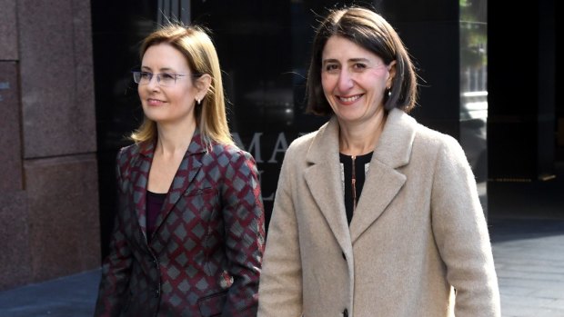 NSW Premier Gladys Berejiklian, right, and Local Government Minister Gabrielle Upton arrive at a press conference in July during which they announced the government's backflip on council mergers. 