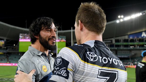 Master and apprentice: Jonathan Thurston congratulates the man who stepped into his massive boots, Michael Morgan, during last year's finals campaign.