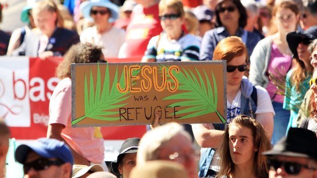 Protesters their point during the Palm Sunday March in Melbourne.