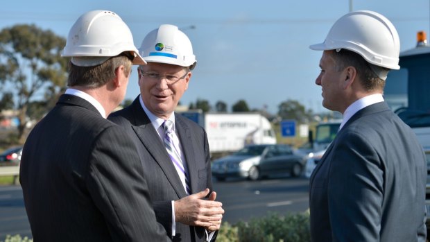 Victorian Premier Denis Napthine talks East West Link with colleagues.