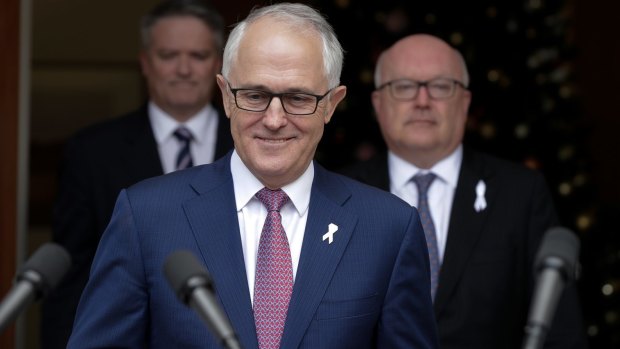 Finance Minister Mathias Cormann, Prime Minister Malcolm Turnbull and Attorney-General George Brandis at Parliament House in Canberra on Tuesday.