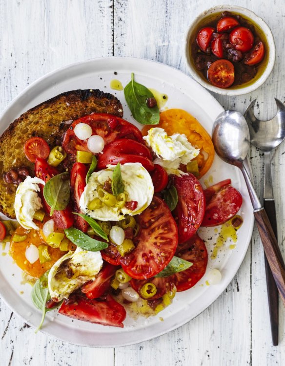 Karen Martini chops the tomatoes into different sizes for textural variety.