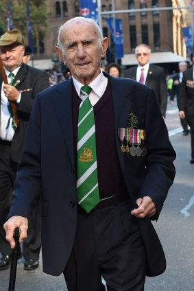 Colin Moir, 92, walking for his mates on Anzac Day last year.