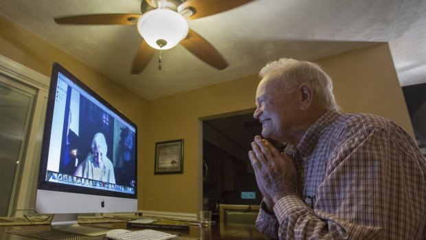 Norwood Thomas, 93, talks with Joyce Morris via Skype.