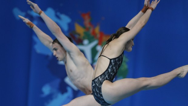 Australia's bronze medalists Domonic Bedggood and Melissa Wu compete during the mixed synchronised 10m platform.