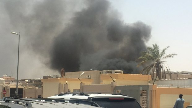 Second attack in a week: Smoke rises outside the Shiite mosque in Dammam, Saudi Arabia.