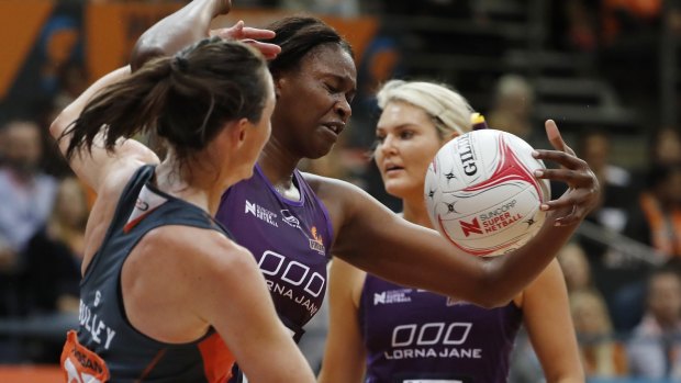 Visiting star: Romelda Aiken keeps possession at Sydney Olympic Park Sports Centre.