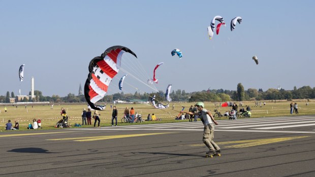 The abandoned Tempelhof airport is now popular for kiting.