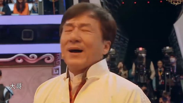 Jackie Chan is overwhelmed during stunt team tribute. 