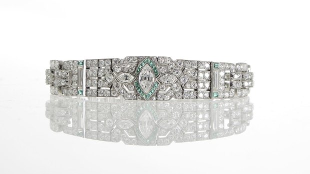 Dazzling: A platinum Art Deco bracelet with a marquise cut diamond set within a cluster of emeralds, from Rutherford of Melbourne.