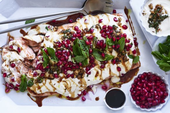 This salmon topped with tahini sauce, walnuts, mint and pomegranate is great warm or cold.