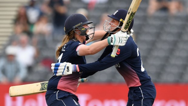 England's Anya Shrubsole (left) and Jenny Gunn celebrate the winning runs.