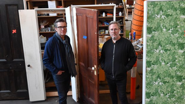 Keith Courtney, left, and Christian Wagstaff with some of the doors for their Melbourne Festival project. 