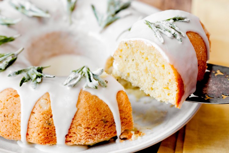 Yotam Ottolenghi's rosemary, olive oil and orange cake with crystalised rosemary sprigs.