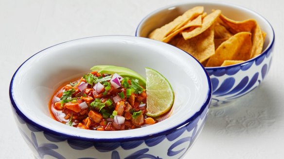 Ceviche rojo with corn chips.