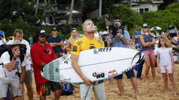 Taking a break: Mick Fanning before the start of his heat on the final day of the season-closing Pipeline Masters event.