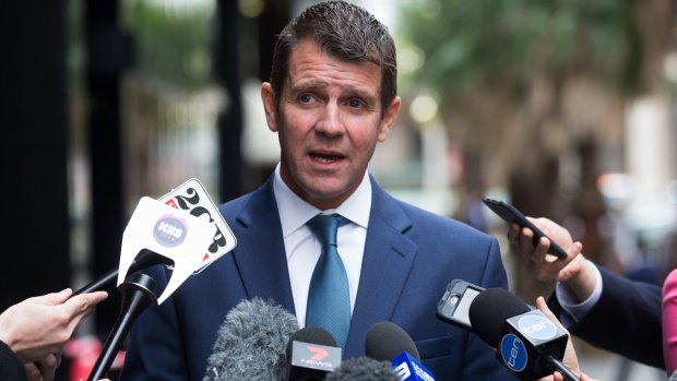 "Look at what they have been through": Premier Mike Baird on Tuesday. 