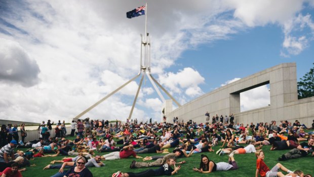 Hundreds rolled down the lawns of Parliament House to protest the current fence proposal