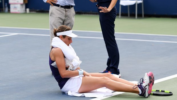 Johanna Konta is tended to by the trainer during her second round Women's Singles match on Day Three of the 2016 US Open.