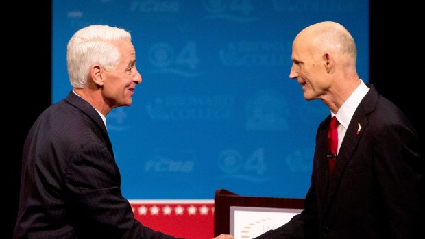 No substance: a televised debate between Democrat challenger Charlie Crist (left) and Florida Governor Rick Scott is remembered chiefly for Mr Crist's podium having a fan fitted to stop him sweating under TV lights.