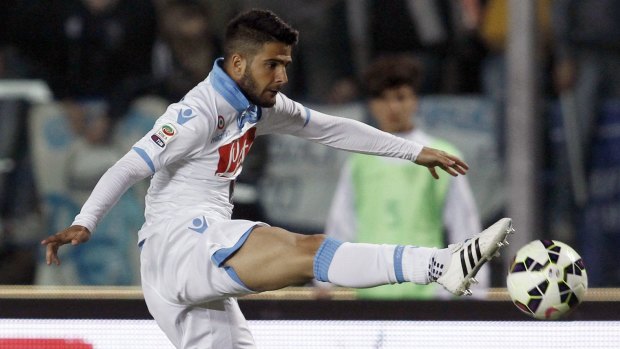 Napoli's Lorenzo Insigne reaches for the ball during Serie A match between Napoli and Empoli.