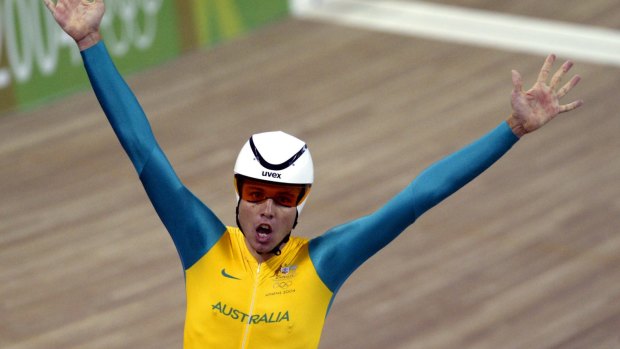 Golden ride:  Brett Lancaster celebrates his team's win at the 2004 Olympics.