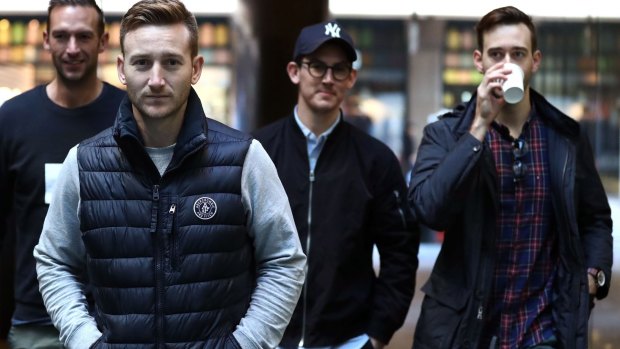 Australian cricketers Trent Copeland, Peter Nevill, Nic Maddinson and Kurtis Patterson arrive at a players' union meeting on July 2 to discuss the pay crisis. 