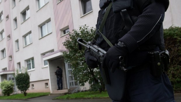 Police officers secure a residential area in Chemnitz, eastern Germany.