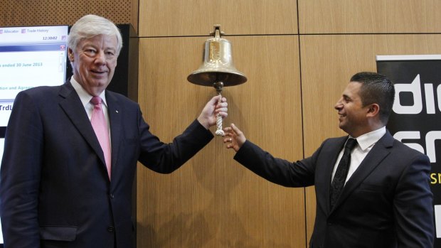 Anchorage Capital Partners managing director Phil Cave rings the bell  with Dick Smith CEO Nick Abboud at the retailer's stock market debut.