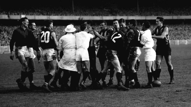 Mick Twomey was involved in this scrap during the 1958 grand final.