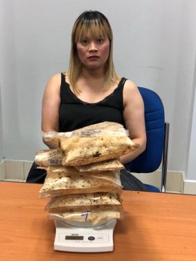 1814 grams of heroin were allegedly found in Ve Thi Tran's luggage